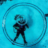 master-scuba-diver-making-bubble-ring-inception-underwater