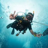 coral-grand-divers-descending-underwater
