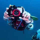 jean-michel-diver-instructor-coral-grand-divers-with-olympus-camera-underwater-photography